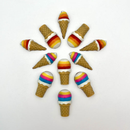 Vibrant chocolate ice cream cones arranged in a circular pattern. Hand-painted in bright rainbow colours and detailed waffle-like cone.