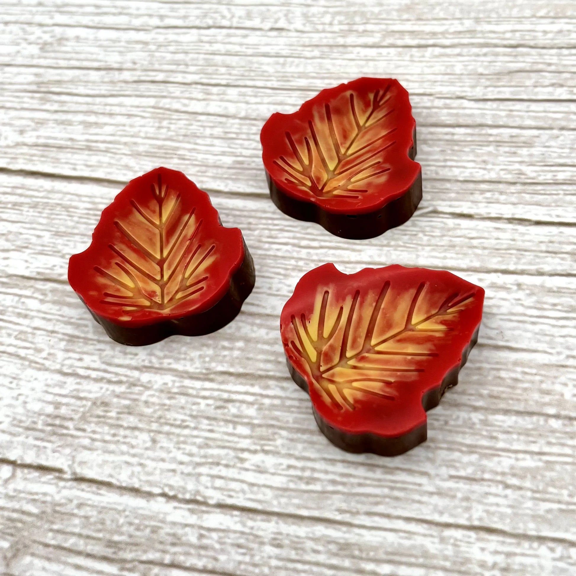 Chocolate aspen leaf, overlaid with blended fall colours of yellow, orange and red.