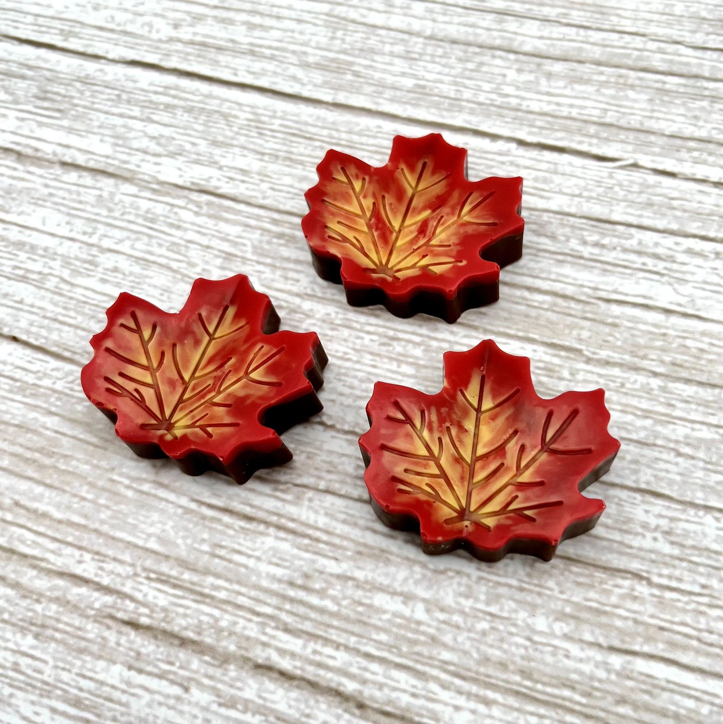 Chocolate maple leaf, overlaid with blended fall colours of yellow, orange and red.