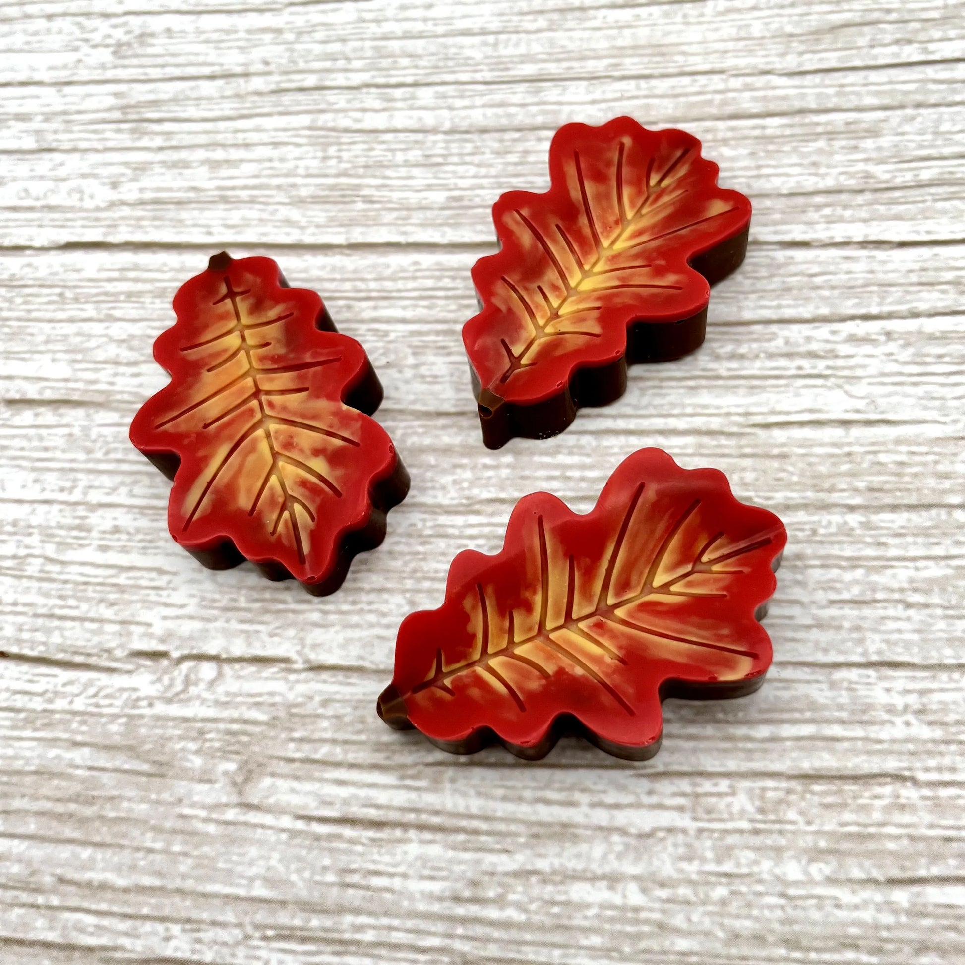 Chocolate oak leaf, overlaid with blended fall colours of yellow, orange and red.