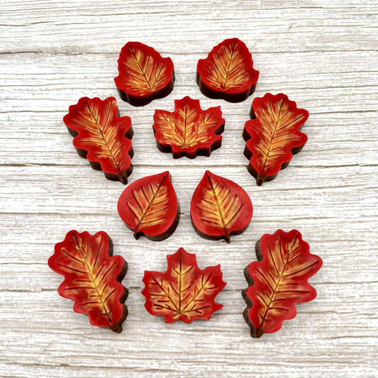 Chocolate maple, oak, ash and aspen leaves, overlaid with blended fall colours of yellow, orange and red.