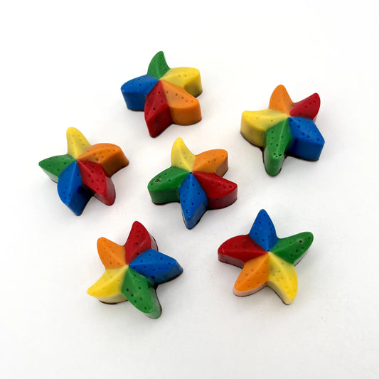 Fun 5-pointed chocolate star, coloured in blue, green, yellow, orange and red.