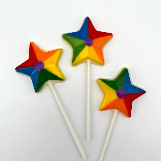 Fun 5-pointed chocolate star sucker, coloured in blue, green, yellow, orange and red, with a purple circle in the middle.