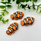 Clownfish chocolates, brilliantly detailed in orange, black and white.