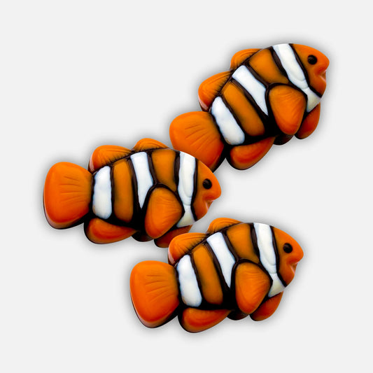 Clownfish chocolates, brilliantly detailed in orange, black and white.