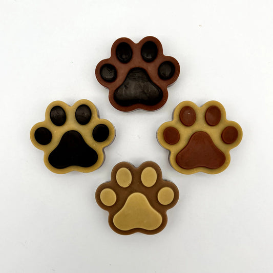 Paw prints in two-toned brown, made from chocolate.