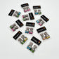 Mini chocolate bunnies, decorated in grey, white and pink with multi-colour bowties. Presented as 2-packs in Clayton Creative Chocolates packaging.