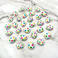 Mini chocolate easter eggs decorated with dots in 7 bright colours.