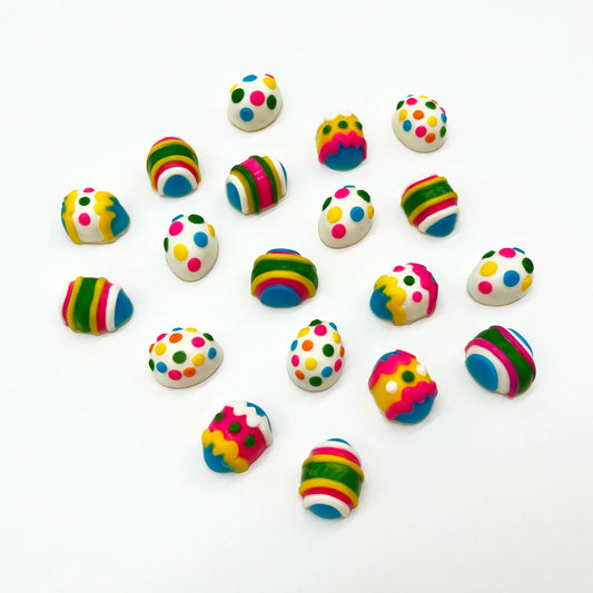 Selection of mini chocolate easter eggs, decorated with dots and stripes in 7 vibrant Easter colours.