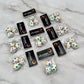 Mini chocolate easter eggs decorated with dots in 7 bright colours. Presented as 3-packs in Clayton Creative Chocolates packaging.
