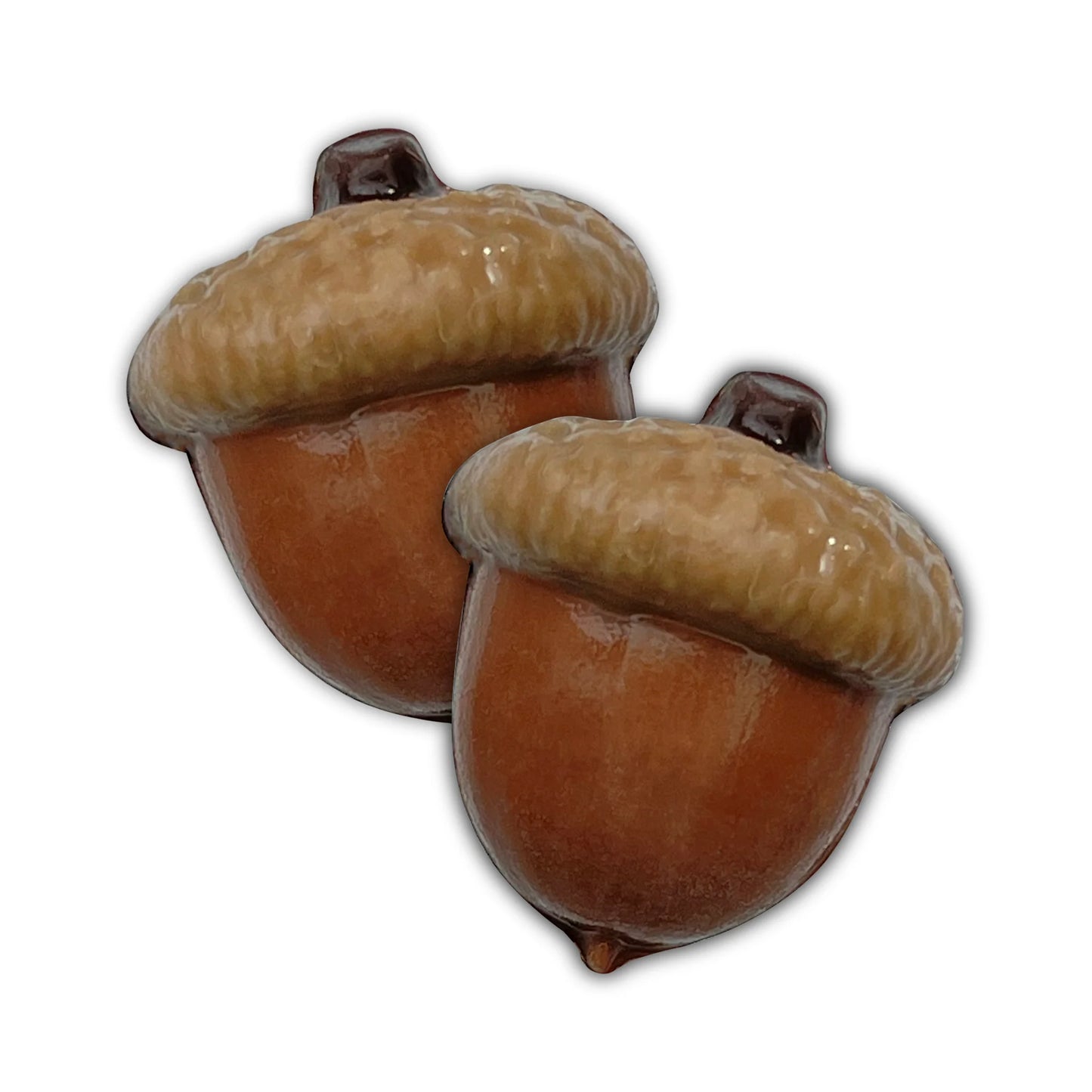 Selection of realistic-looking chocolate acorns in real-life browns and black.