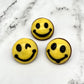 Classic yellow and black smile emojis, made from chocolate. 