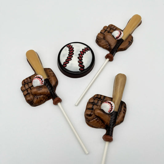 Baseball glove, bat and ball in realistic colours of brown, black, white and red - all made from chocolate as suckers.