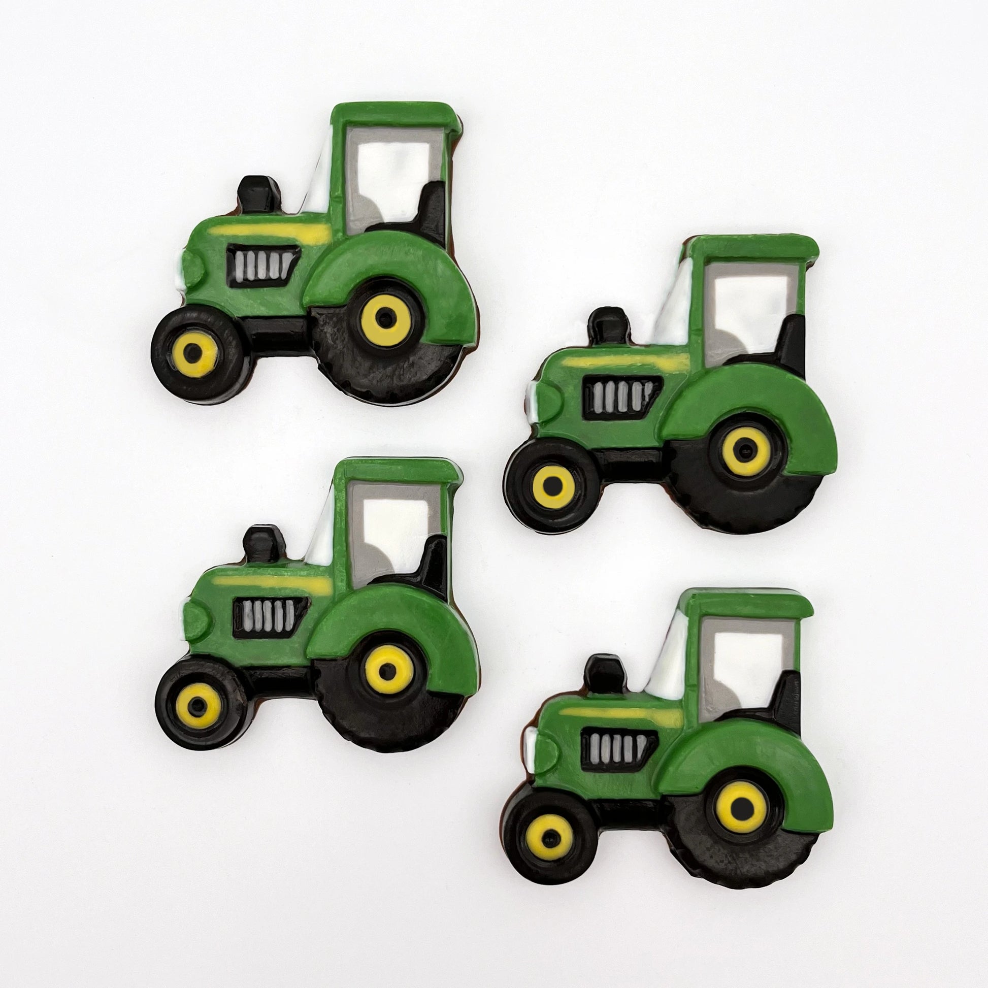 Chocolate farm tractors in signature John Deere green and yellow colour palette. For anyone who loves farming and the countryside.