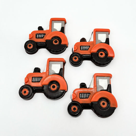 Chocolate farm tractors in signature Kubota orange colour palette. For anyone who loves farming and the countryside.